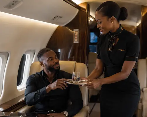Luxury private jet interior, passenger relaxing in-flight